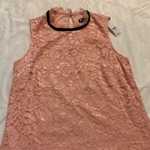 Pink blouse with black neckline